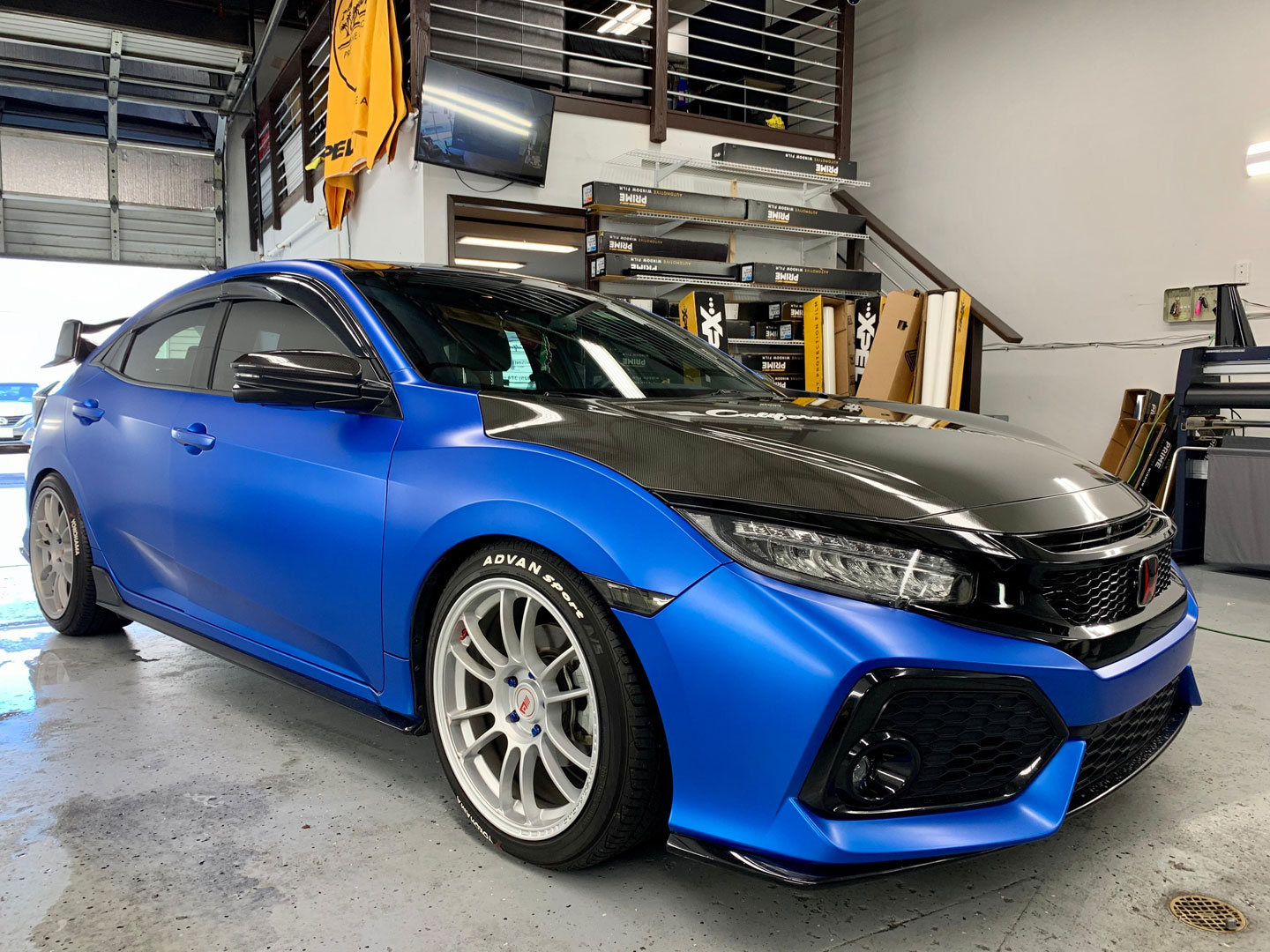 black and blue car inside garage